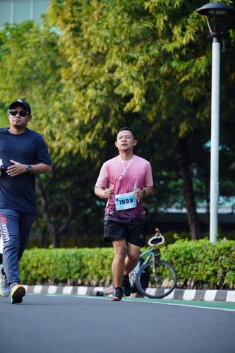 Race photo from KEMLU RUN 2025