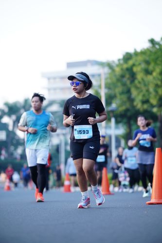 Race photo from KEMLU RUN 2025