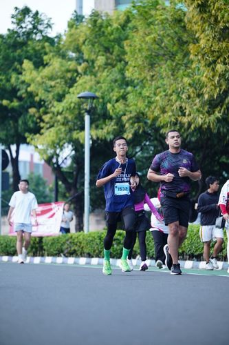 Race photo from KEMLU RUN 2025