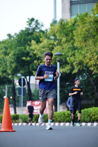 Race photo from KEMLU RUN 2025