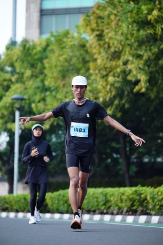 Race photo from KEMLU RUN 2025