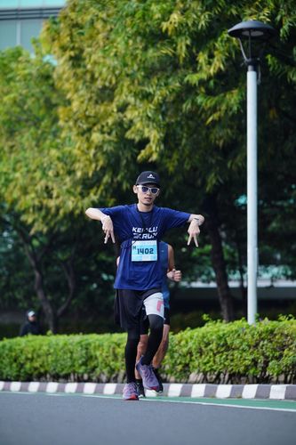 Race photo from KEMLU RUN 2025