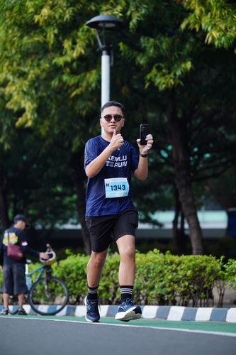 Race photo from KEMLU RUN 2025