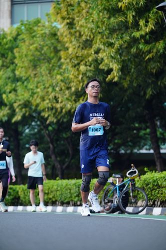 Race photo from KEMLU RUN 2025