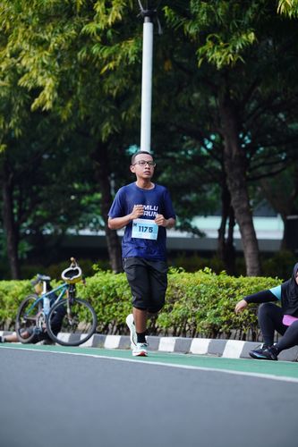 Race photo from KEMLU RUN 2025