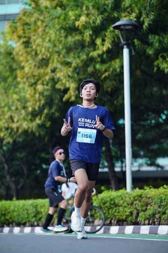 Race photo from KEMLU RUN 2025
