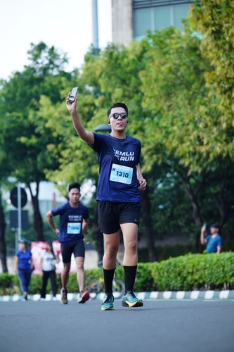 Race photo from KEMLU RUN 2025