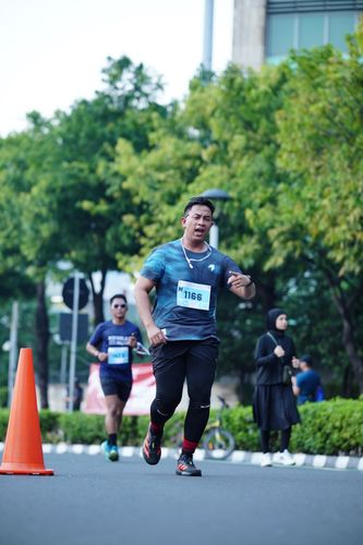 Race photo from KEMLU RUN 2025