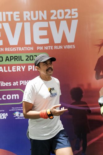 Race photo from PIK NITE RUN VIBES