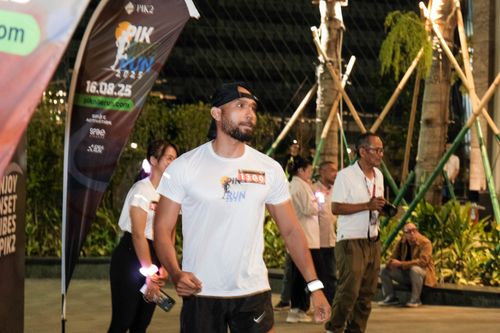 Race photo from PIK NITE RUN VIBES