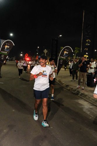 Race photo from PIK NITE RUN VIBES