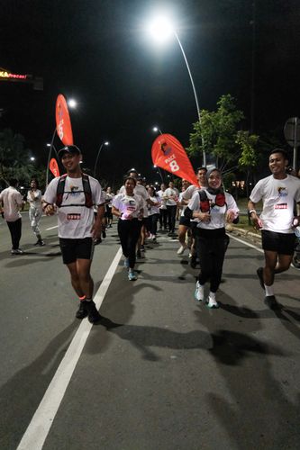 Race photo from PIK NITE RUN VIBES