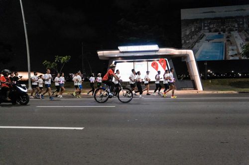 Race photo from PIK NITE RUN VIBES