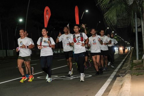 Race photo from PIK NITE RUN VIBES