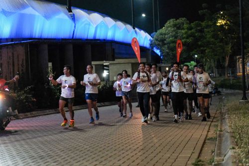 Race photo from PIK NITE RUN VIBES