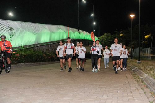 Race photo from PIK NITE RUN VIBES