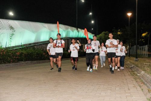Race photo from PIK NITE RUN VIBES