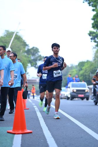 Race photo from KEMLU RUN 2025