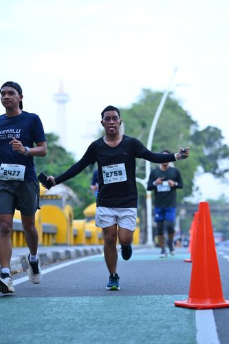 Race photo from KEMLU RUN 2025