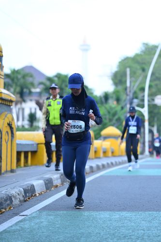 Race photo from KEMLU RUN 2025