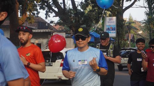 Race photo from Happy One Decade Unpad Runner