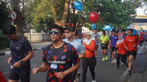 Race photo from Happy One Decade Unpad Runner