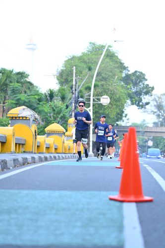 Race photo from KEMLU RUN 2025