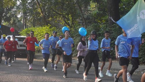 Race photo from Happy One Decade Unpad Runner