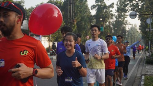Race photo from Happy One Decade Unpad Runner
