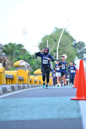 Race photo from KEMLU RUN 2025