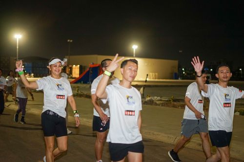 Race photo from PIK NITE RUN VIBES