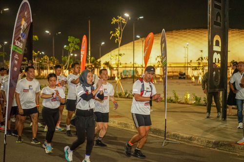 Race photo from PIK NITE RUN VIBES