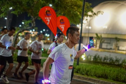 Race photo from PIK NITE RUN VIBES