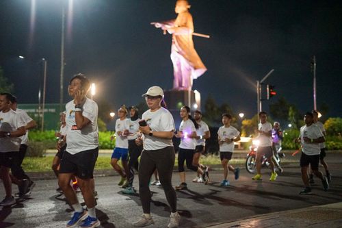 Race photo from PIK NITE RUN VIBES