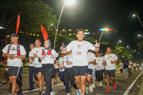 Race photo from PIK NITE RUN VIBES