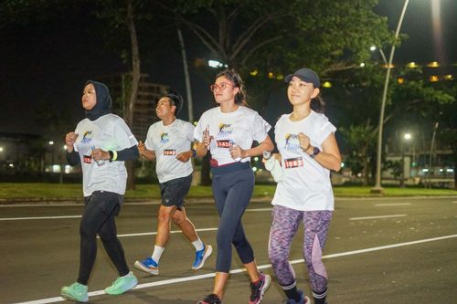 Race photo from PIK NITE RUN VIBES