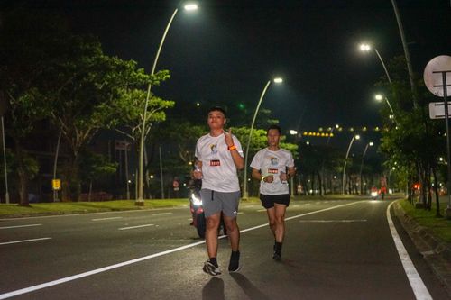 Race photo from PIK NITE RUN VIBES