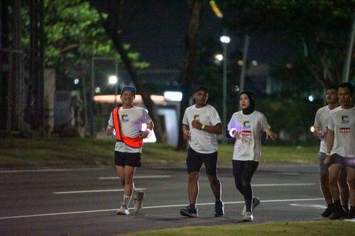 Race photo from PIK NITE RUN VIBES