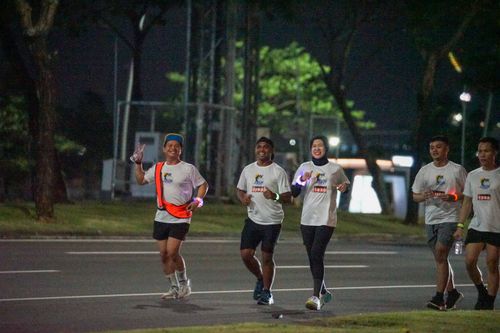 Race photo from PIK NITE RUN VIBES