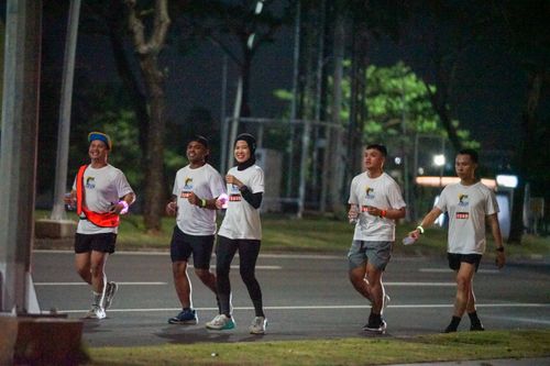 Race photo from PIK NITE RUN VIBES