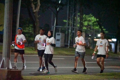 Race photo from PIK NITE RUN VIBES