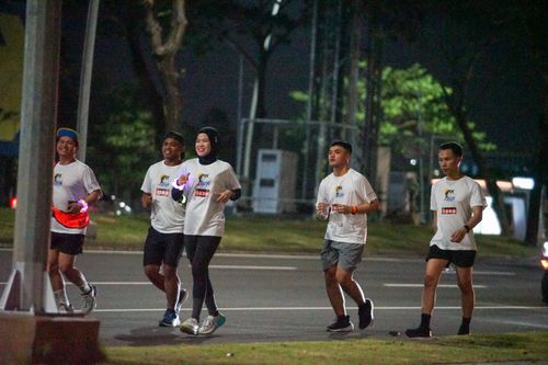 Race photo from PIK NITE RUN VIBES