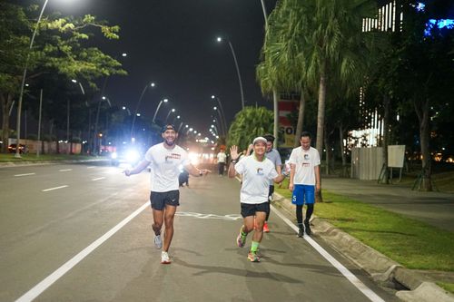 Race photo from PIK NITE RUN VIBES