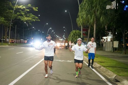 Race photo from PIK NITE RUN VIBES