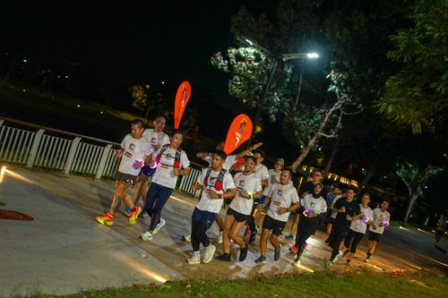 Race photo from PIK NITE RUN VIBES