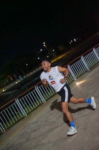 Race photo from PIK NITE RUN VIBES