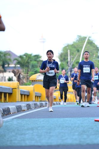 Race photo from KEMLU RUN 2025