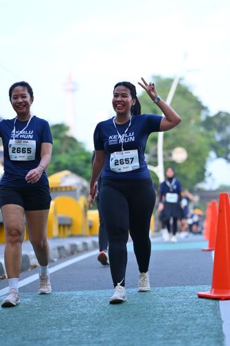 Race photo from KEMLU RUN 2025