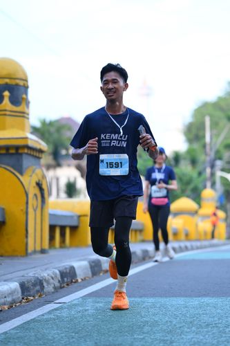 Race photo from KEMLU RUN 2025