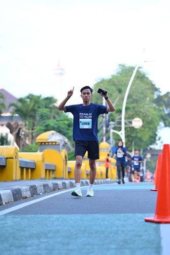 Race photo from KEMLU RUN 2025
